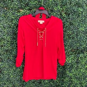 Red Michael Kors blouse with matching red belt❤️